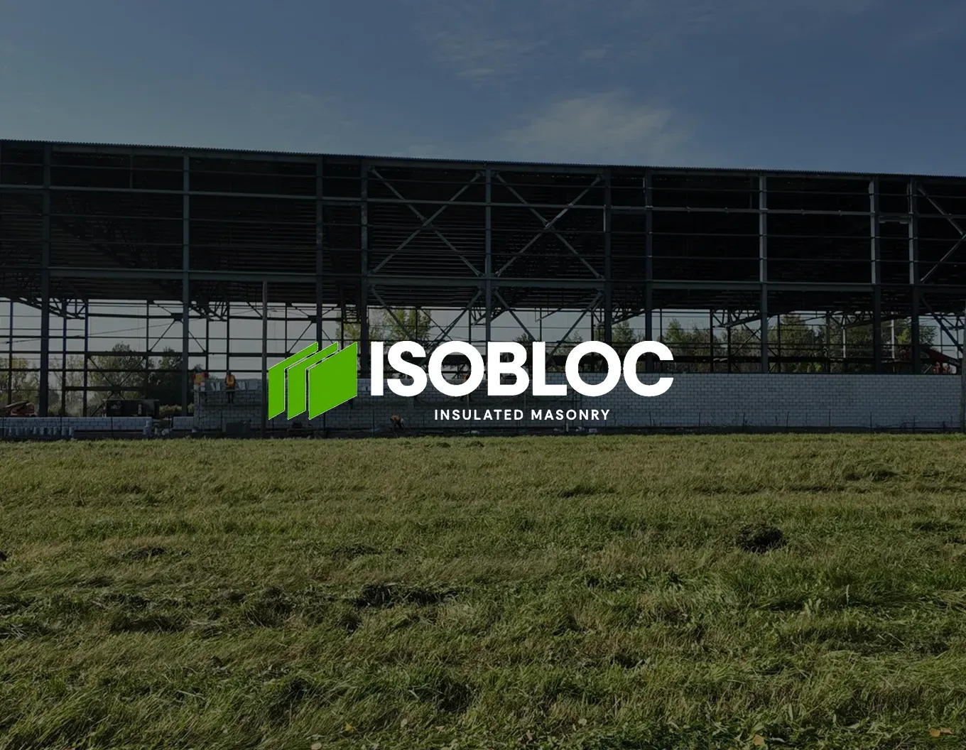 The Isobloc logo over a building under construction